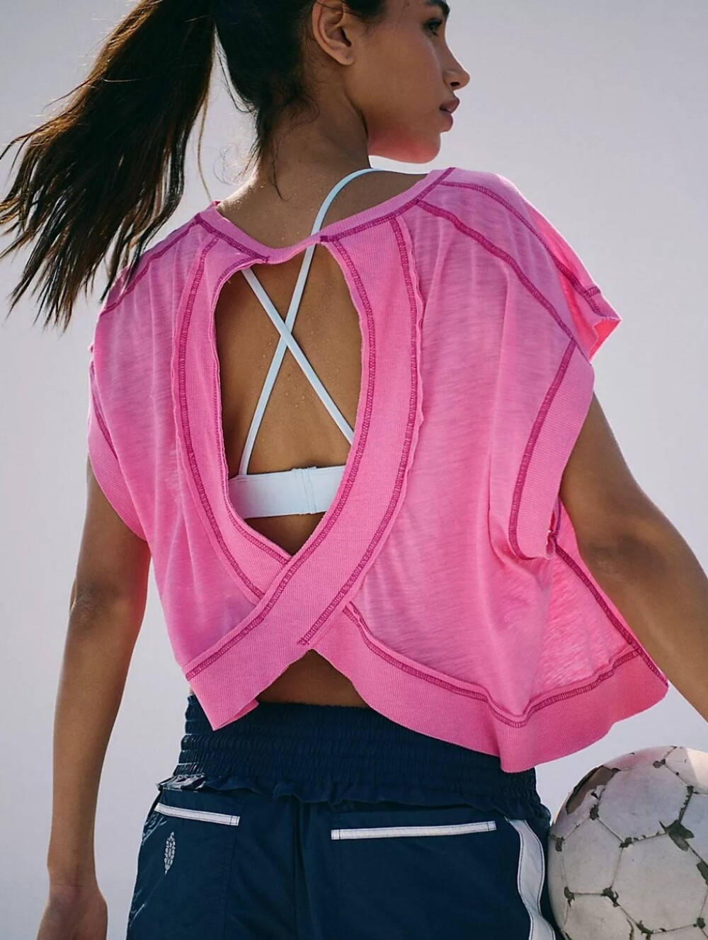 FP Movement by Free People My Time Tee featuring a stylish cross-back strap